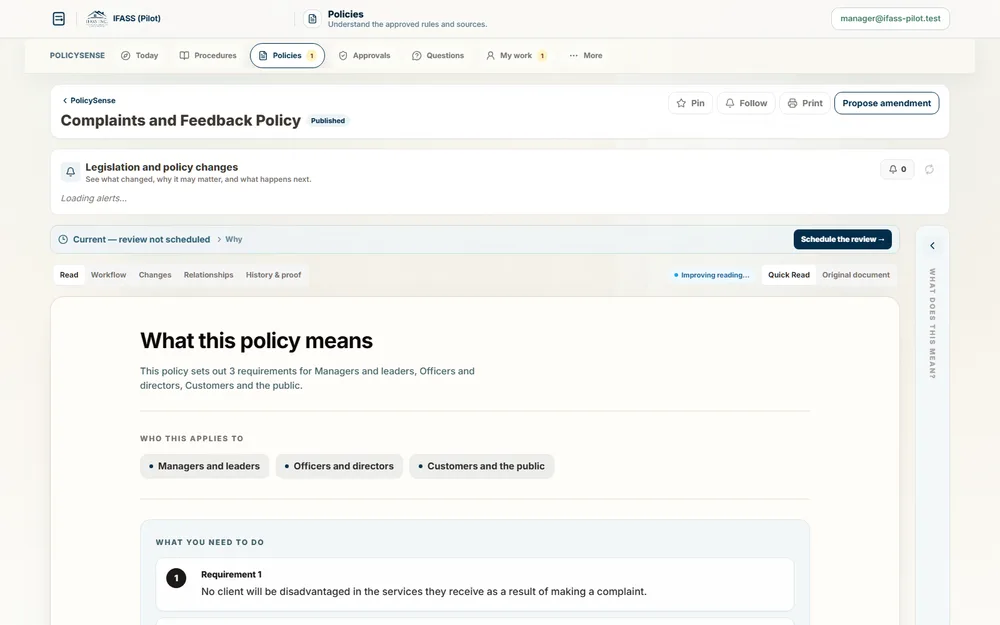 An approved policy open beside its plain-language Quick Read.